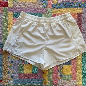 Women’s White Lined Calia Running Shorts